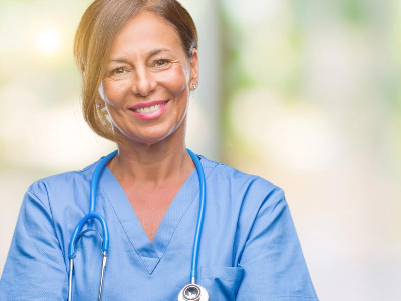 Doctor with stethoscope smiling